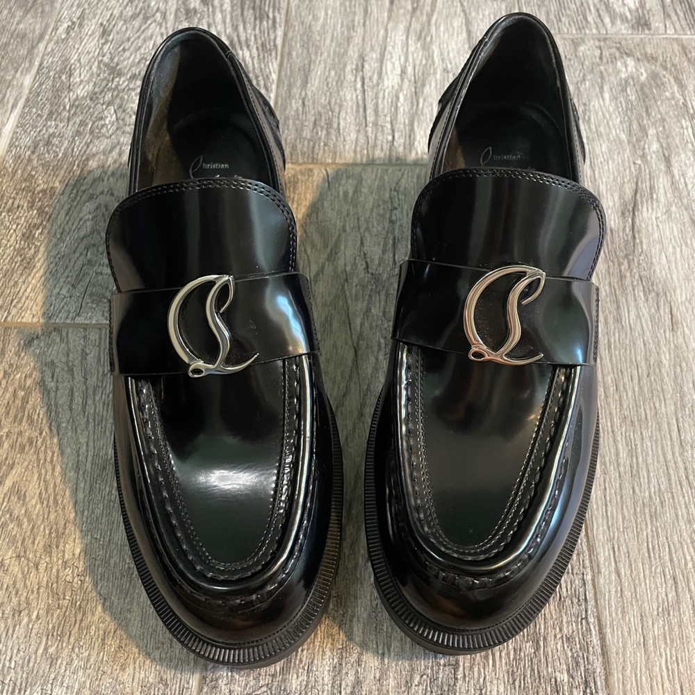 Christian Louboutin Patent Medallion Red Sole Loafers
Size 37